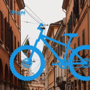 Strada del centro storico di Bologna con illustrazione grafica di una bicicletta in primo piano tra i palazzi cittadini.